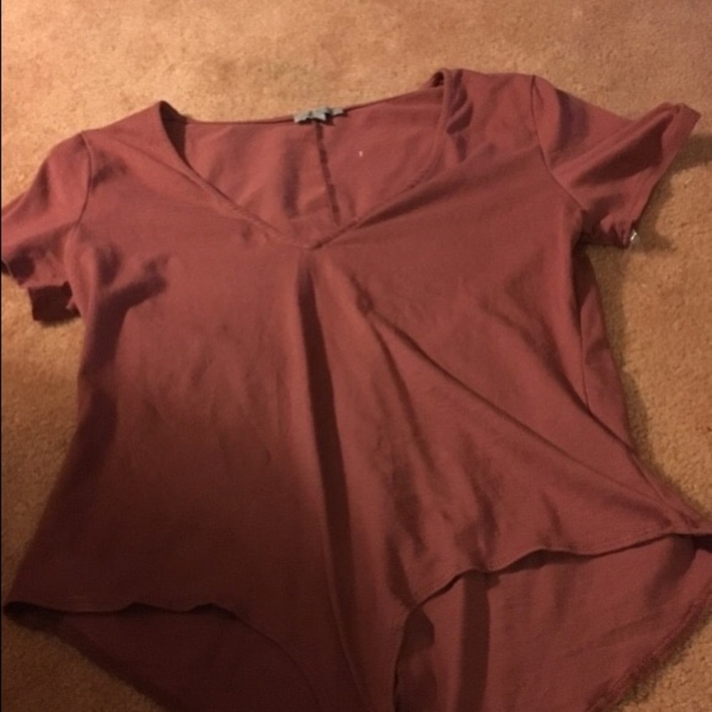 Tan/pinkish onesie